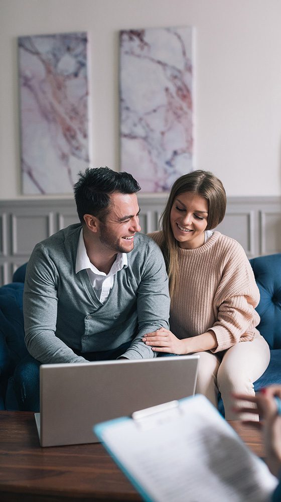 younger couple meeting their financial advisor